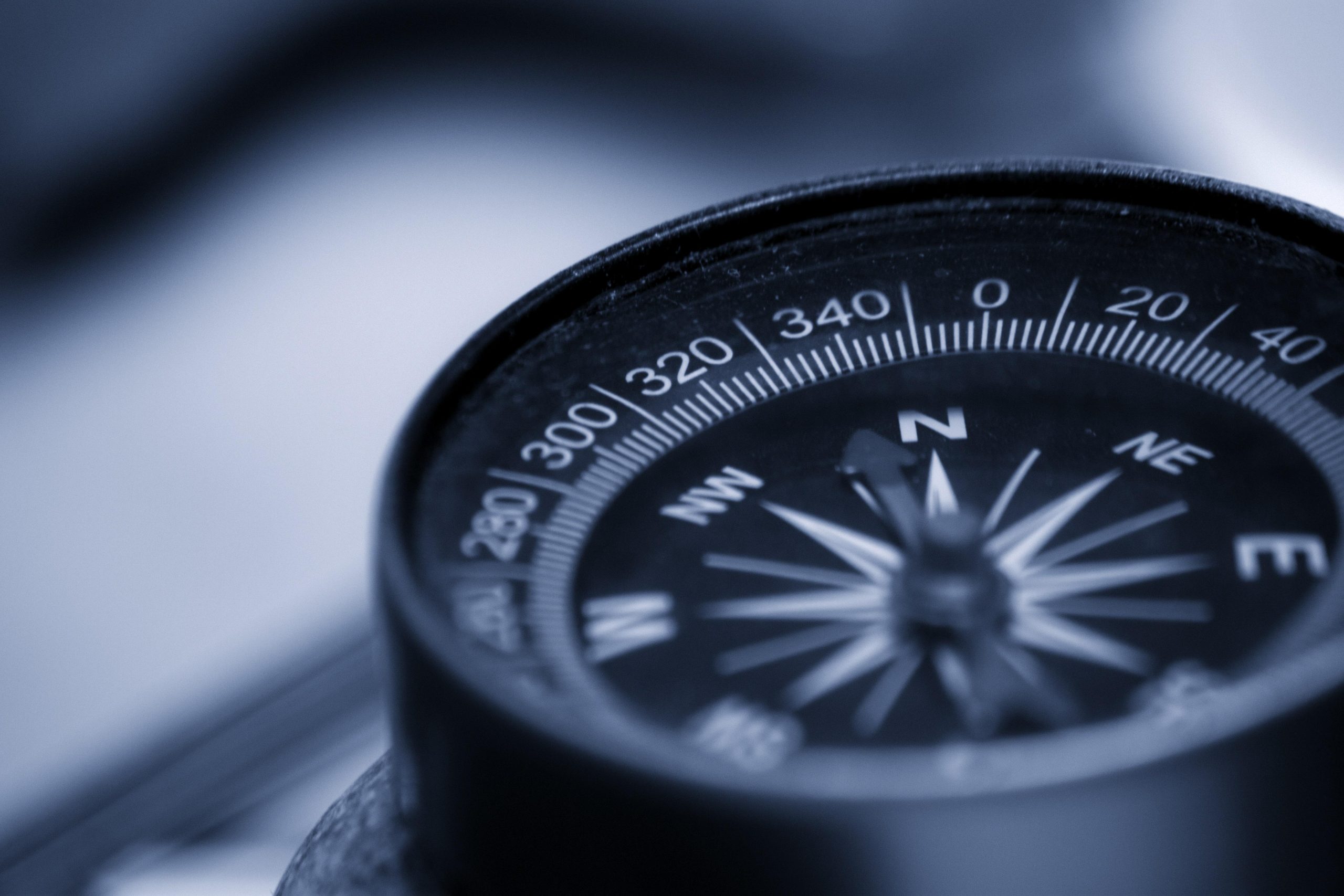 Close-up of a compass representing a North Star direction